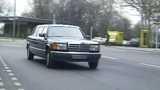 Busty and horny German MILF getting her round tits covered in the car